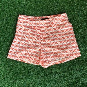 Orange and white, patterned shorts